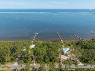 Enjoy views of the Gulf on this waterfront, 1-acre parcel with on St. James Bay in Florida - for sale on GolfHomes.com, golf home, golf lot