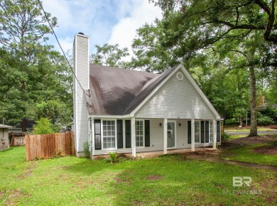 This Charming Two Story Cottage Is The Perfect Place To Call on Lake Forest Yacht and Country Club in Alabama - for sale on GolfHomes.com, golf home, golf lot