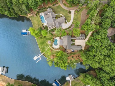 OUTSTANDING PANORAMIC VIEWS - 6BR/6.5BA LAKEFRONT HOME IN on Great Waters Course At Reynolds Plantation in Georgia - for sale on GolfHomes.com, golf home, golf lot