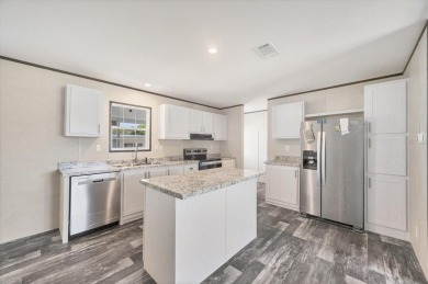 Beautiful brand new 2025 Champion home located in an extremely on Sabal Trace Golf and Country Club in Florida - for sale on GolfHomes.com, golf home, golf lot