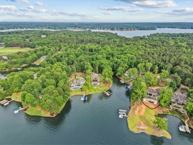 OUTSTANDING PANORAMIC VIEWS - 6BR/6.5BA LAKEFRONT HOME IN on Great Waters Course At Reynolds Plantation in Georgia - for sale on GolfHomes.com, golf home, golf lot