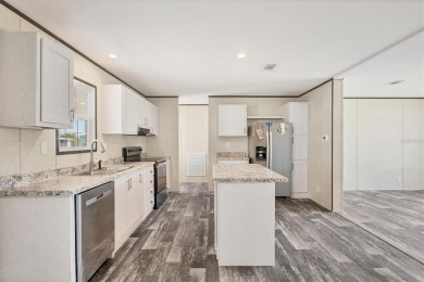 Beautiful brand new 2025 Champion home located in an extremely on Sabal Trace Golf and Country Club in Florida - for sale on GolfHomes.com, golf home, golf lot