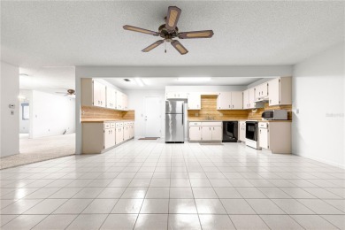 This spacious villa is located in the much sought after 55+ on On Top of the World Golf Course in Florida - for sale on GolfHomes.com, golf home, golf lot