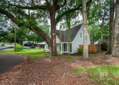 This Charming Two Story Cottage Is The Perfect Place To Call on Lake Forest Yacht and Country Club in Alabama - for sale on GolfHomes.com, golf home, golf lot