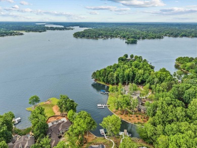 OUTSTANDING PANORAMIC VIEWS - 6BR/6.5BA LAKEFRONT HOME IN on Great Waters Course At Reynolds Plantation in Georgia - for sale on GolfHomes.com, golf home, golf lot