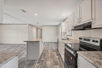 Beautiful brand new 2025 Champion home located in an extremely on Sabal Trace Golf and Country Club in Florida - for sale on GolfHomes.com, golf home, golf lot