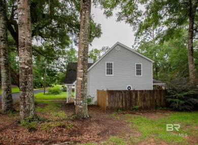 This Charming Two Story Cottage Is The Perfect Place To Call on Lake Forest Yacht and Country Club in Alabama - for sale on GolfHomes.com, golf home, golf lot