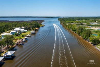BUILDER WILL INCLUDE REFRIGERATOR AND BLINDS FOR ANY BUYER WHO on The Golf Club of the Wharf in Alabama - for sale on GolfHomes.com, golf home, golf lot