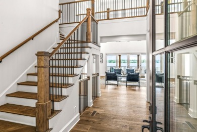 OUTSTANDING PANORAMIC VIEWS - 6BR/6.5BA LAKEFRONT HOME IN on Great Waters Course At Reynolds Plantation in Georgia - for sale on GolfHomes.com, golf home, golf lot