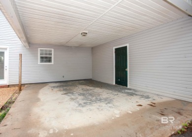 This Charming Two Story Cottage Is The Perfect Place To Call on Lake Forest Yacht and Country Club in Alabama - for sale on GolfHomes.com, golf home, golf lot