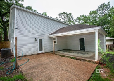 This Charming Two Story Cottage Is The Perfect Place To Call on Lake Forest Yacht and Country Club in Alabama - for sale on GolfHomes.com, golf home, golf lot