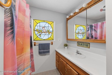 Step into a home that feels welcoming from the moment you arrive on High Point Golf Club, Inc. in Florida - for sale on GolfHomes.com, golf home, golf lot