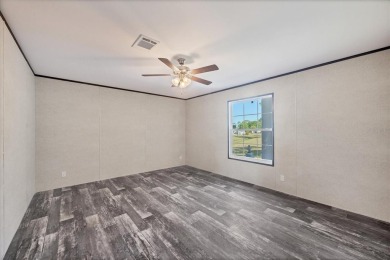Beautiful brand new 2025 Champion home located in an extremely on Sabal Trace Golf and Country Club in Florida - for sale on GolfHomes.com, golf home, golf lot