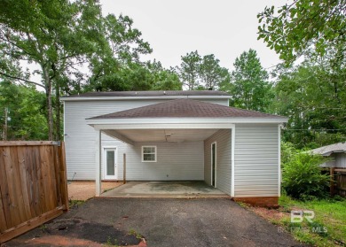 This Charming Two Story Cottage Is The Perfect Place To Call on Lake Forest Yacht and Country Club in Alabama - for sale on GolfHomes.com, golf home, golf lot