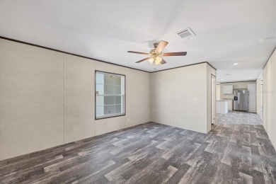 Beautiful brand new 2025 Champion home located in an extremely on Sabal Trace Golf and Country Club in Florida - for sale on GolfHomes.com, golf home, golf lot