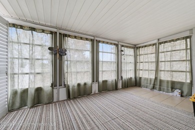 Step into a home that feels welcoming from the moment you arrive on High Point Golf Club, Inc. in Florida - for sale on GolfHomes.com, golf home, golf lot