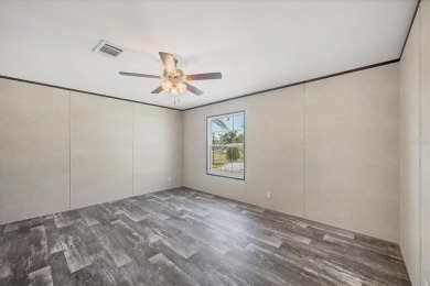 Beautiful brand new 2025 Champion home located in an extremely on Sabal Trace Golf and Country Club in Florida - for sale on GolfHomes.com, golf home, golf lot