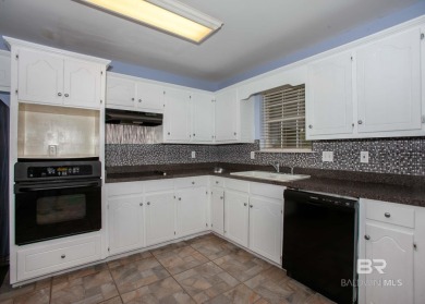 This Charming Two Story Cottage Is The Perfect Place To Call on Lake Forest Yacht and Country Club in Alabama - for sale on GolfHomes.com, golf home, golf lot