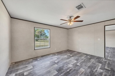 Beautiful brand new 2025 Champion home located in an extremely on Sabal Trace Golf and Country Club in Florida - for sale on GolfHomes.com, golf home, golf lot