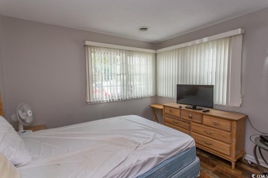 Great 2 bedrooms, 1 full and 1 half bath, fully furnished on Whispering Pines in South Carolina - for sale on GolfHomes.com, golf home, golf lot