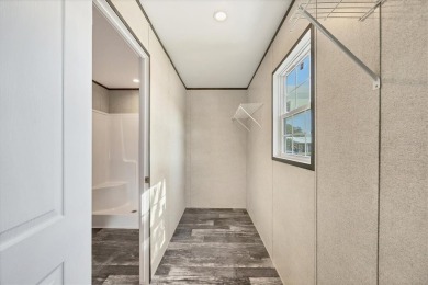 Beautiful brand new 2025 Champion home located in an extremely on Sabal Trace Golf and Country Club in Florida - for sale on GolfHomes.com, golf home, golf lot