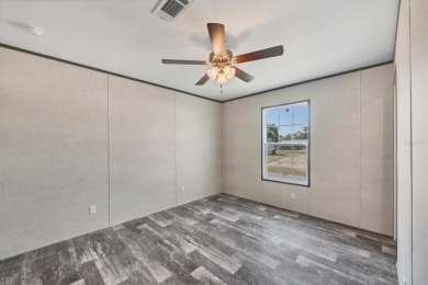 Beautiful brand new 2025 Champion home located in an extremely on Sabal Trace Golf and Country Club in Florida - for sale on GolfHomes.com, golf home, golf lot