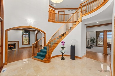 Incredible all-brick 5-bedroom, 5.2-bath home nestled on a quiet on The Merit Club in Illinois - for sale on GolfHomes.com, golf home, golf lot