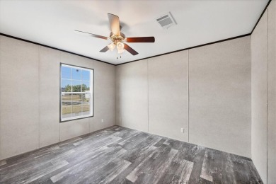 Beautiful brand new 2025 Champion home located in an extremely on Sabal Trace Golf and Country Club in Florida - for sale on GolfHomes.com, golf home, golf lot