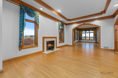 Incredible all-brick 5-bedroom, 5.2-bath home nestled on a quiet on The Merit Club in Illinois - for sale on GolfHomes.com, golf home, golf lot