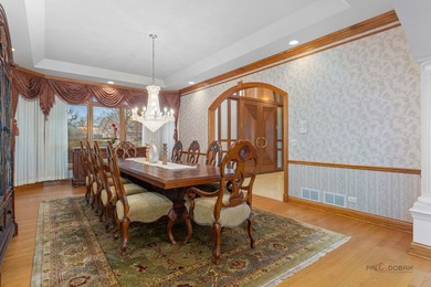 Incredible all-brick 5-bedroom, 5.2-bath home nestled on a quiet on The Merit Club in Illinois - for sale on GolfHomes.com, golf home, golf lot