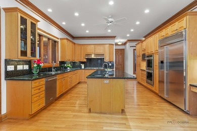 Incredible all-brick 5-bedroom, 5.2-bath home nestled on a quiet on The Merit Club in Illinois - for sale on GolfHomes.com, golf home, golf lot