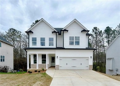 Welcome to 27 Bridgestone Way in the charming Carter Grove on The Plantation Golf Club in Georgia - for sale on GolfHomes.com, golf home, golf lot