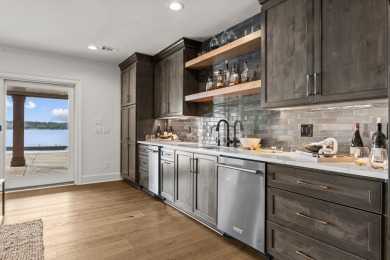 OUTSTANDING PANORAMIC VIEWS - 6BR/6.5BA LAKEFRONT HOME IN on Great Waters Course At Reynolds Plantation in Georgia - for sale on GolfHomes.com, golf home, golf lot