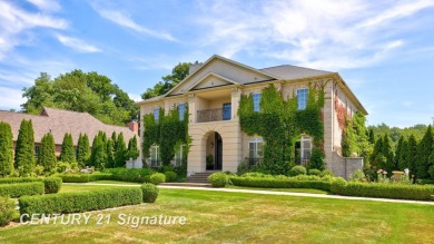 Luxurious 7-Bedroom Home on the 9th Hole of Apple Mountain Golf on Golf Club At Apple Mountain in Michigan - for sale on GolfHomes.com, golf home, golf lot