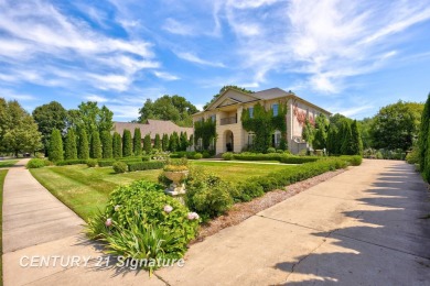 Luxurious 7-Bedroom Home on the 9th Hole of Apple Mountain Golf on Golf Club At Apple Mountain in Michigan - for sale on GolfHomes.com, golf home, golf lot