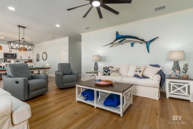 Fall in love with this gorgeous beach house situated on on Isle Dauphine Club Golf Course in Alabama - for sale on GolfHomes.com, golf home, golf lot