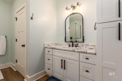 Fall in love with this gorgeous beach house situated on on Isle Dauphine Club Golf Course in Alabama - for sale on GolfHomes.com, golf home, golf lot