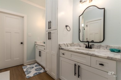 Fall in love with this gorgeous beach house situated on on Isle Dauphine Club Golf Course in Alabama - for sale on GolfHomes.com, golf home, golf lot