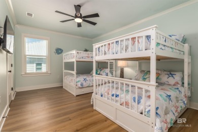 Fall in love with this gorgeous beach house situated on on Isle Dauphine Club Golf Course in Alabama - for sale on GolfHomes.com, golf home, golf lot