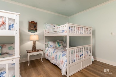Fall in love with this gorgeous beach house situated on on Isle Dauphine Club Golf Course in Alabama - for sale on GolfHomes.com, golf home, golf lot