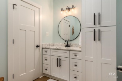 Fall in love with this gorgeous beach house situated on on Isle Dauphine Club Golf Course in Alabama - for sale on GolfHomes.com, golf home, golf lot