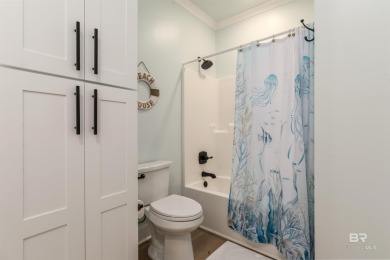 Fall in love with this gorgeous beach house situated on on Isle Dauphine Club Golf Course in Alabama - for sale on GolfHomes.com, golf home, golf lot