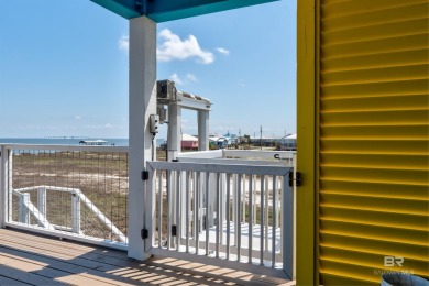Fall in love with this gorgeous beach house situated on on Isle Dauphine Club Golf Course in Alabama - for sale on GolfHomes.com, golf home, golf lot