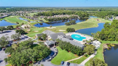 Come and enjoy a very active and social lifestyle living in the on Tampa Bay Golf and Country Club in Florida - for sale on GolfHomes.com, golf home, golf lot