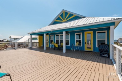 Fall in love with this gorgeous beach house situated on on Isle Dauphine Club Golf Course in Alabama - for sale on GolfHomes.com, golf home, golf lot