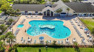 Come and enjoy a very active and social lifestyle living in the on Tampa Bay Golf and Country Club in Florida - for sale on GolfHomes.com, golf home, golf lot