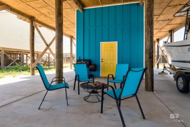 Fall in love with this gorgeous beach house situated on on Isle Dauphine Club Golf Course in Alabama - for sale on GolfHomes.com, golf home, golf lot