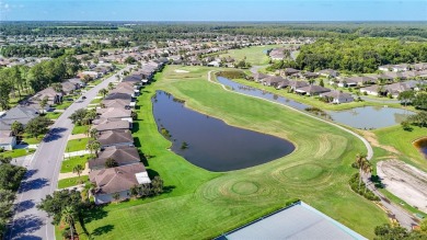Come and enjoy a very active and social lifestyle living in the on Tampa Bay Golf and Country Club in Florida - for sale on GolfHomes.com, golf home, golf lot