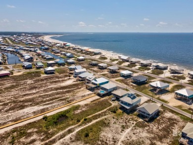 Fall in love with this gorgeous beach house situated on on Isle Dauphine Club Golf Course in Alabama - for sale on GolfHomes.com, golf home, golf lot