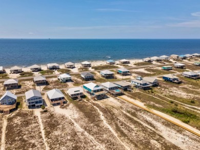 Fall in love with this gorgeous beach house situated on on Isle Dauphine Club Golf Course in Alabama - for sale on GolfHomes.com, golf home, golf lot